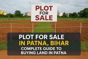 Open land plot for sale in Patna, Bihar with clear boundary and real estate signboard for buyers and investors